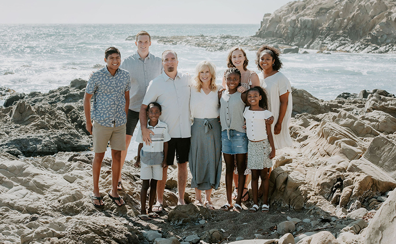 Bill with wife and seven kids